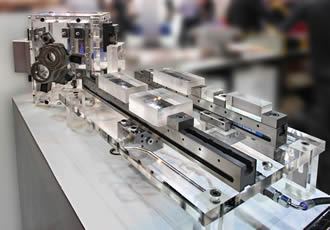 Hydraulic version of low-profile clamping system enables automation